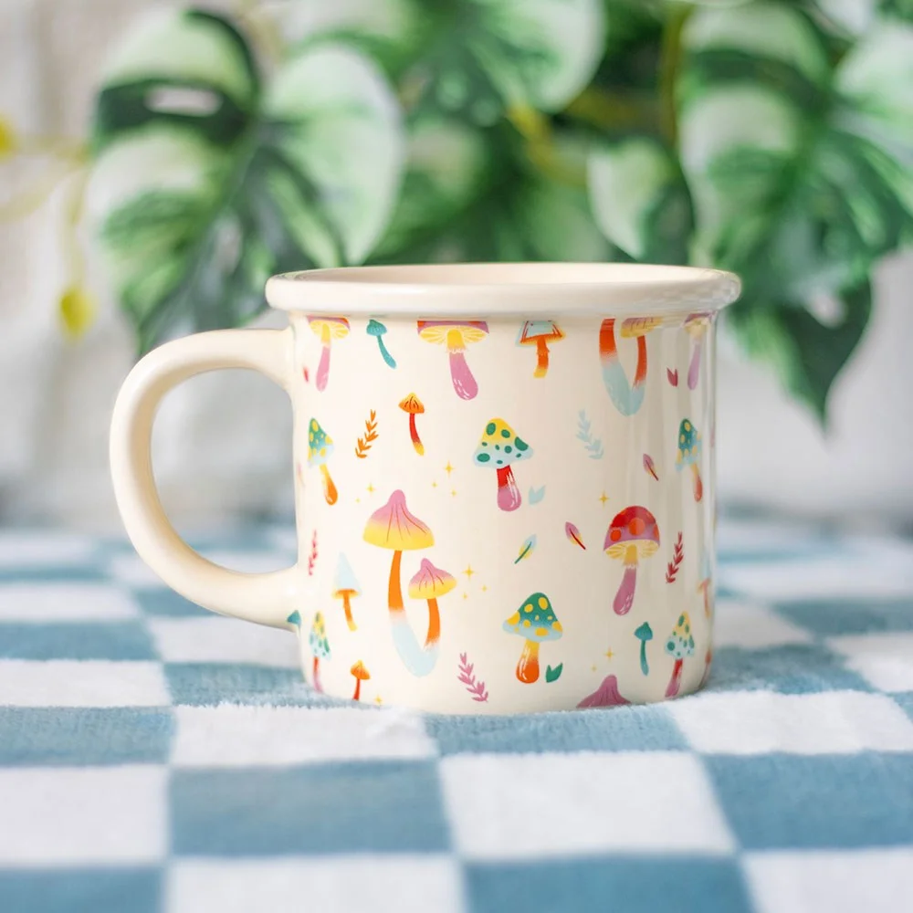 Colourful ceramic mushroom print mug with vibrant mushroom design, 350ml capacity, shown on white background