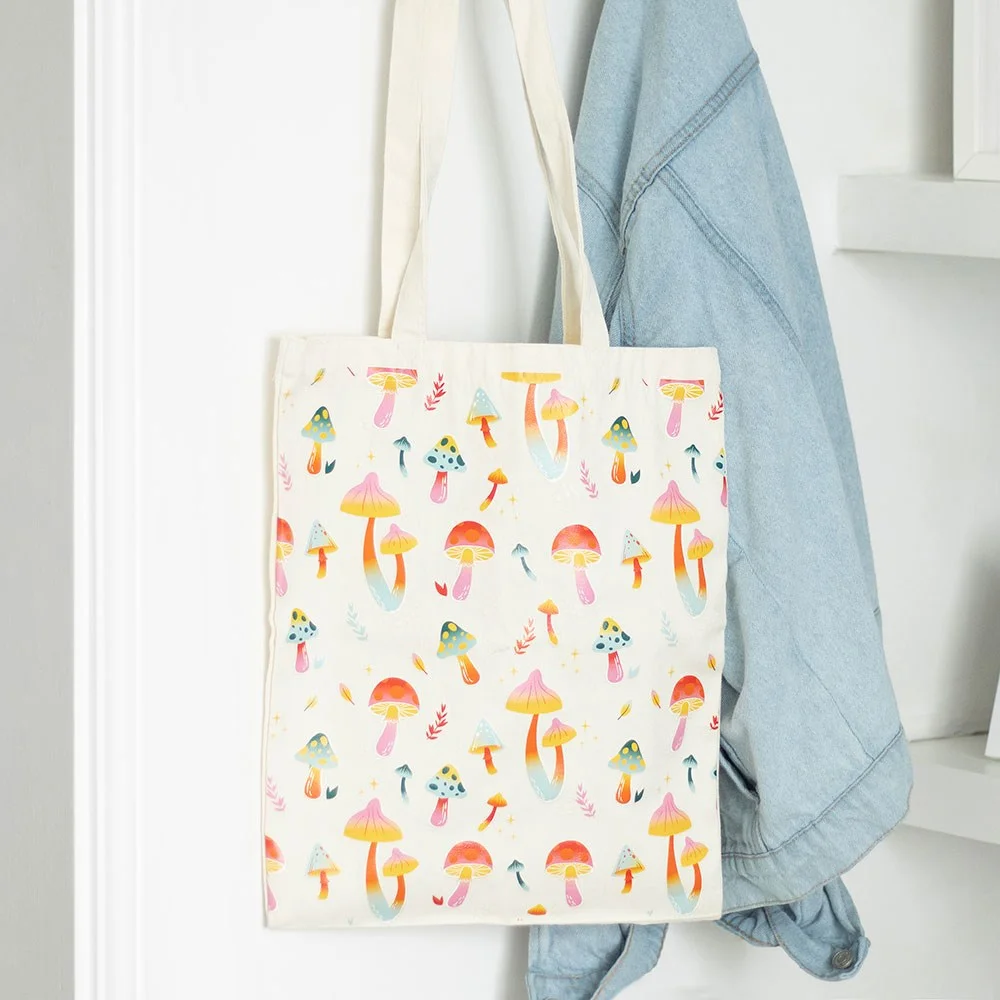 Polycotton tote bag with colorful funky mushroom print on durable canvas fabric, ideal for groceries and essentials