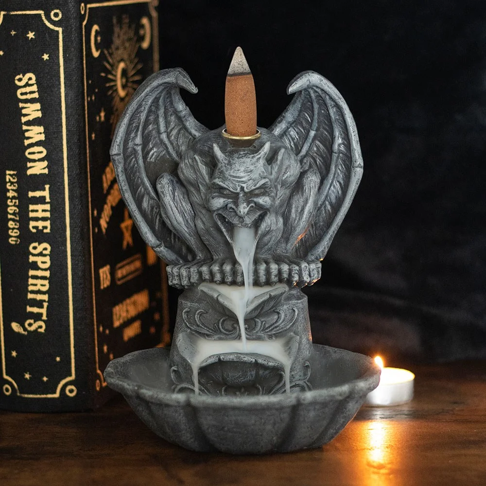 Gothic stone gargoyle incense burner with smoke flowing from its mouth, designed for backflow incense cones