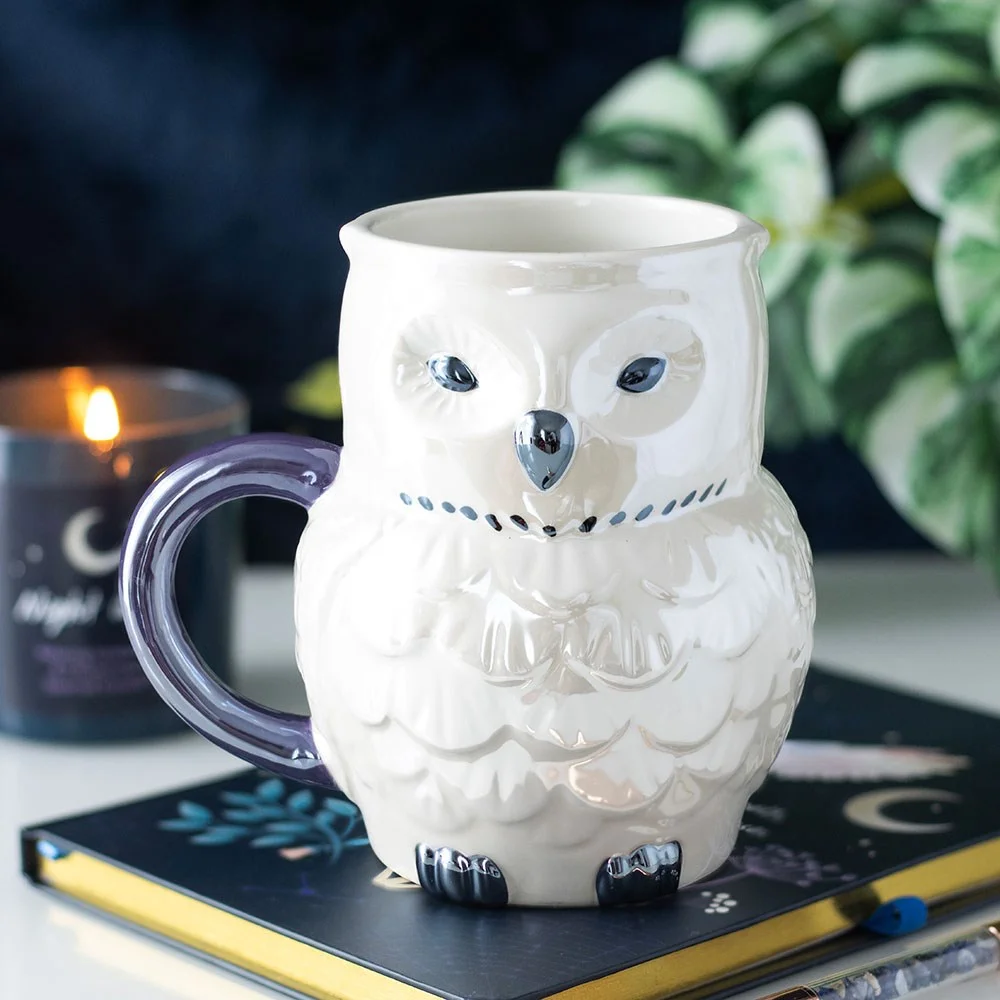 Owl shaped mug with iridescent glaze and detailed feathers, 320ml capacity, on a white background