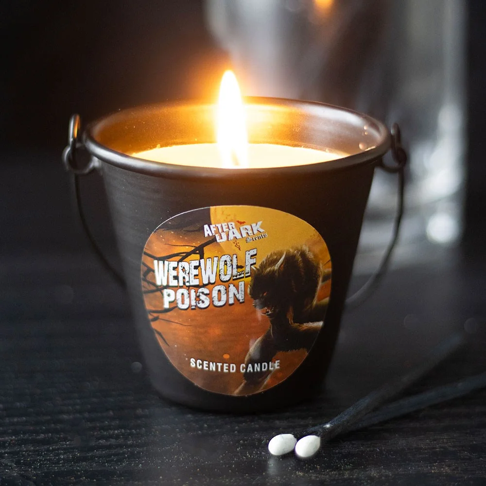 Werewolf poison candle in a metal bucket holder with gothic design, part of After Dark collection, vanilla scented.