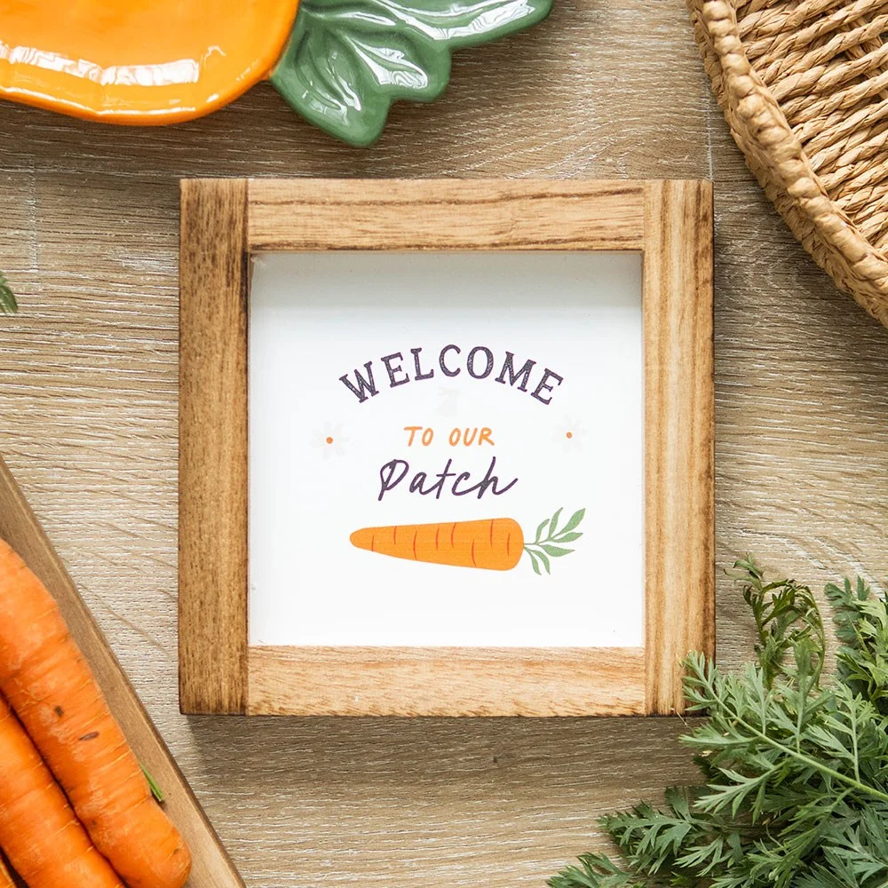 Square wooden frame sign with "Welcome to Our Patch" text, featuring a bunny and carrot illustration for home decor