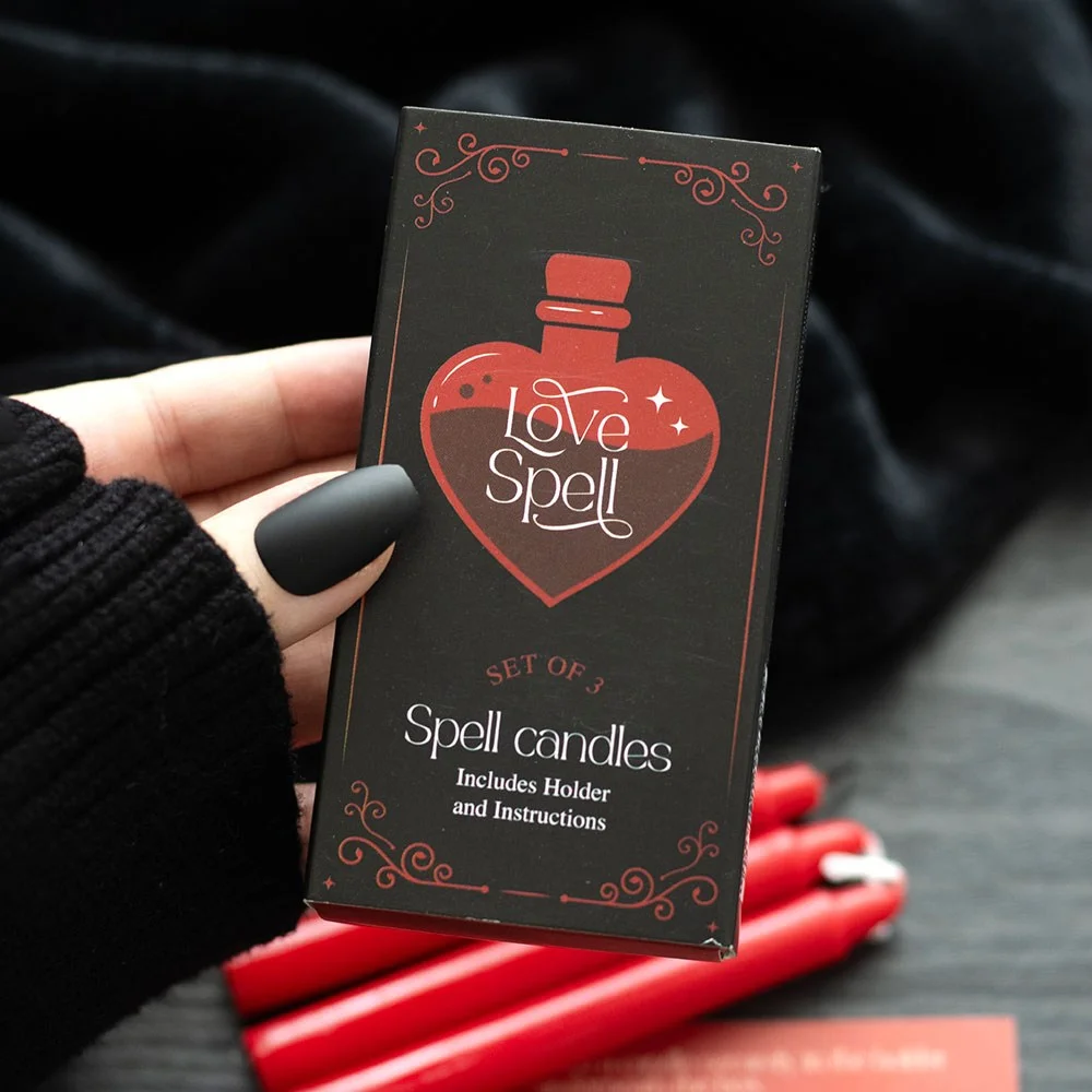 Set of 3 unscented love spell candles in a box with sliding matchbox holder and instruction sheet visible