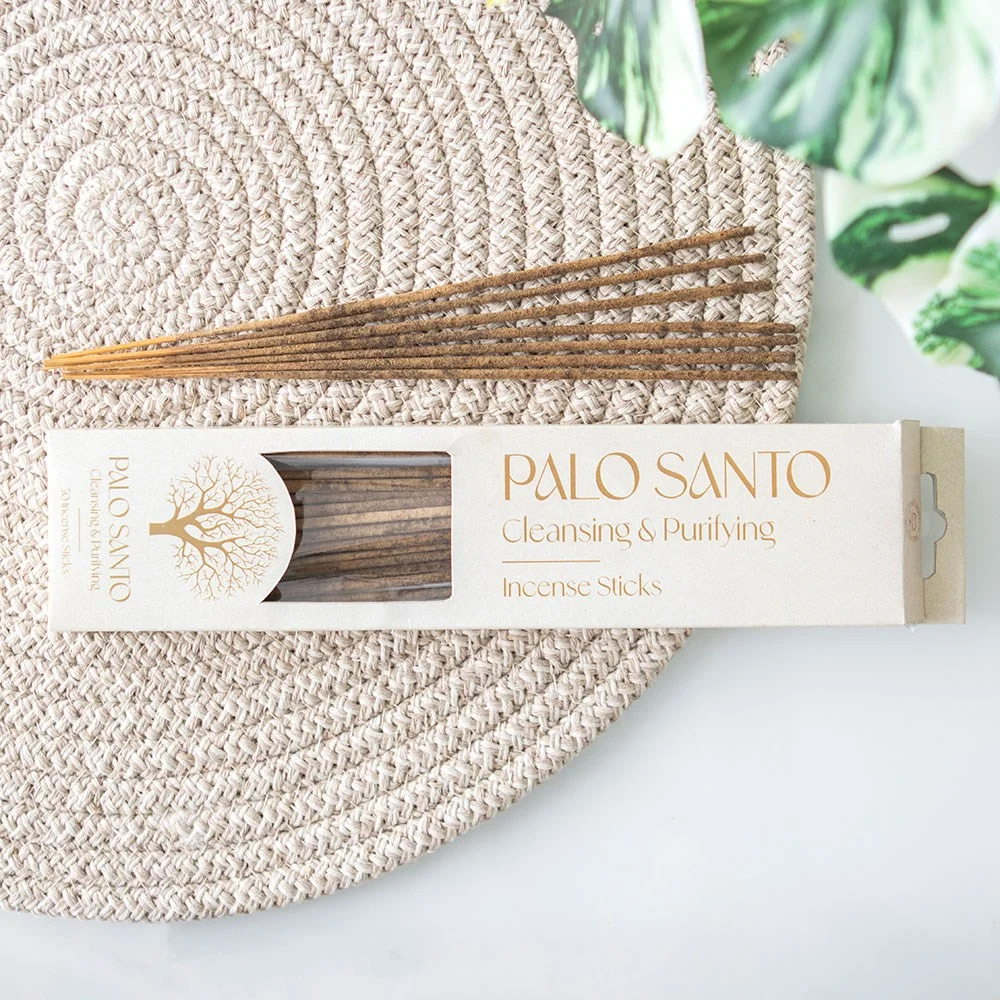 Pack of 30 natural Palo Santo incense sticks with smooth wooden texture arranged on a white background