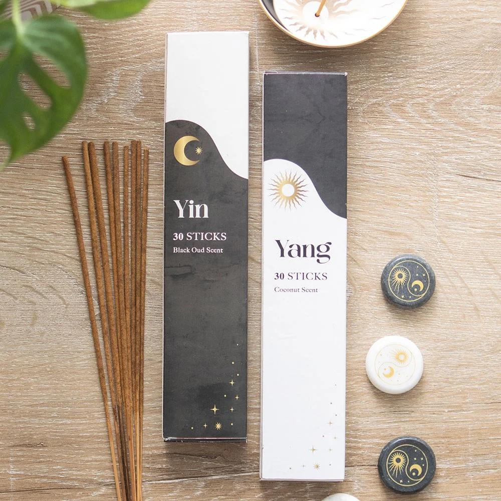 Two packs of Yin Yang incense sticks, one Black Oud and one Coconut, each containing 30 sticks for balanced scents