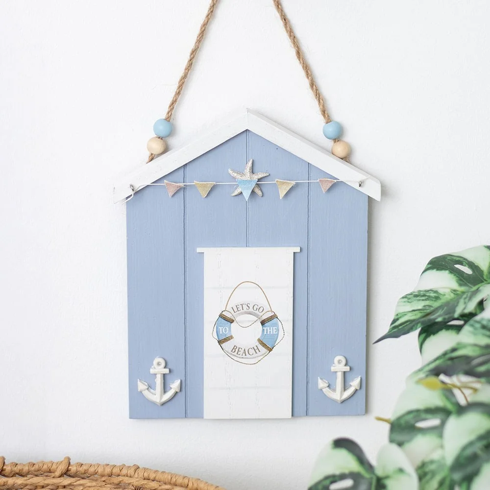 Blue beach hut hanging decoration featuring a blue life ring decoration with "Let's Go to the Beach" text