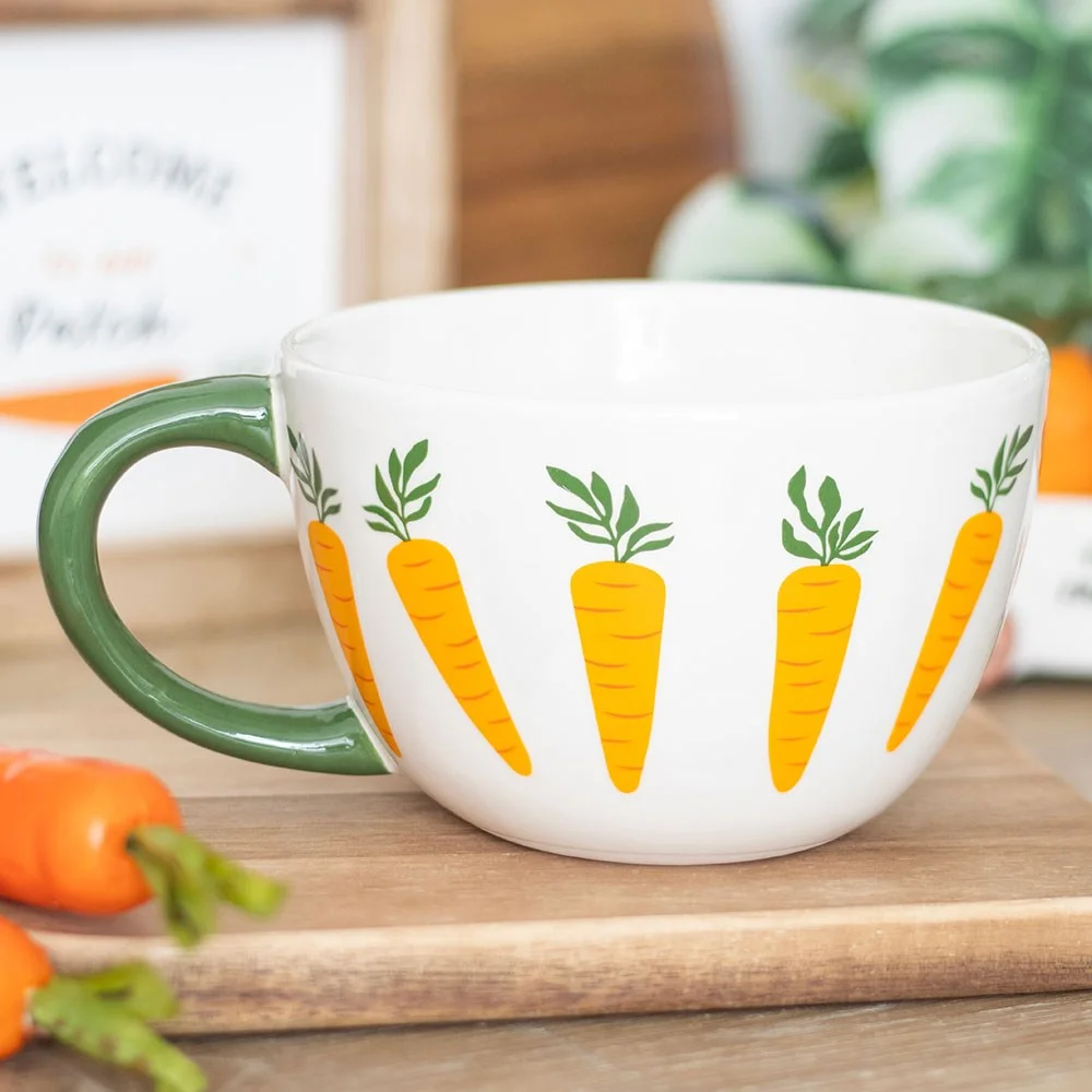 Oversized teacup mug with rustic finish and orange carrot design, 500ml capacity, handcrafted style