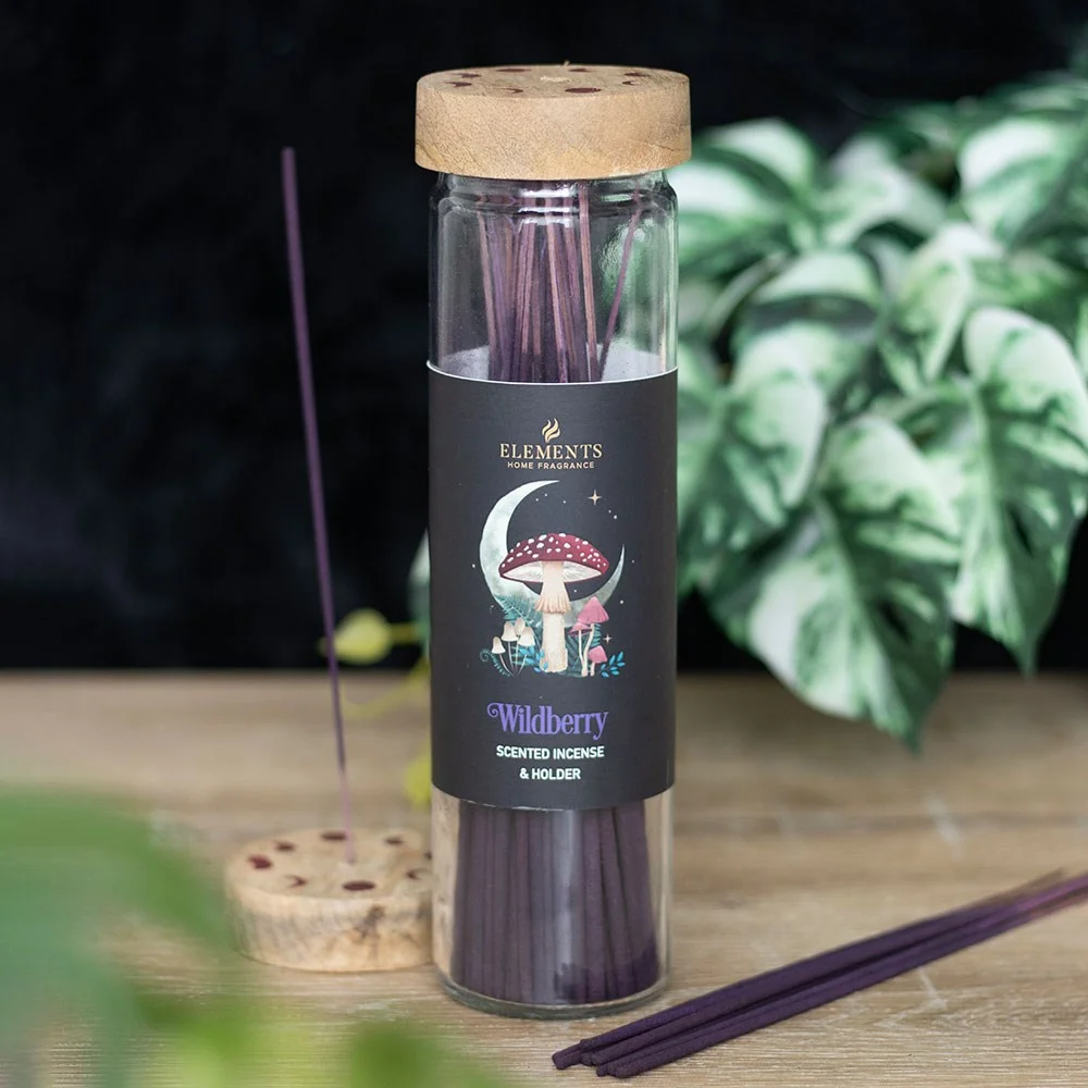Tube of dark forest wild berry incense sticks with wooden lid featuring mushroom and crescent moon design