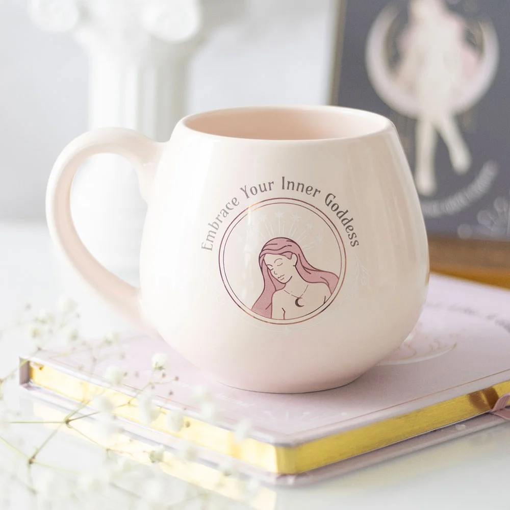 Pastel pink rounded ceramic mug with goddess design and "Embrace Your Inner Goddess" text, 550ml capacity