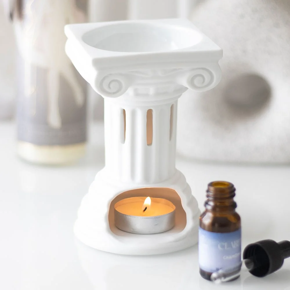 White Greek column oil burner and wax warmer with a bowl on top for fragrance oils or wax melts