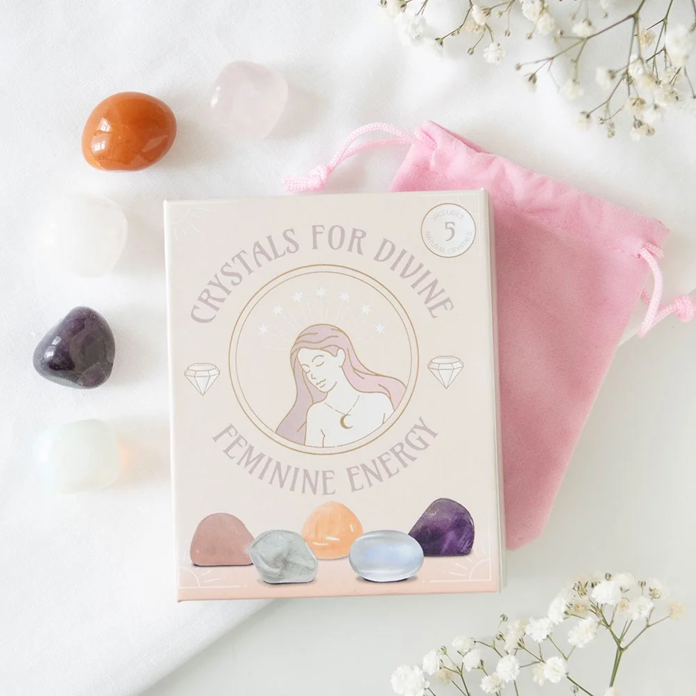 Set of 5 divine feminine crystals set including amethyst, clear quartz, opalite, rose quartz, and peach aventurine on white background