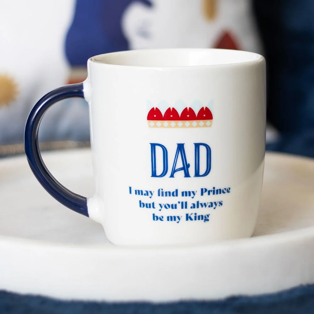 White Dad mug with navy handle, crown design, and message "I may find my prince, but you'll always be my king