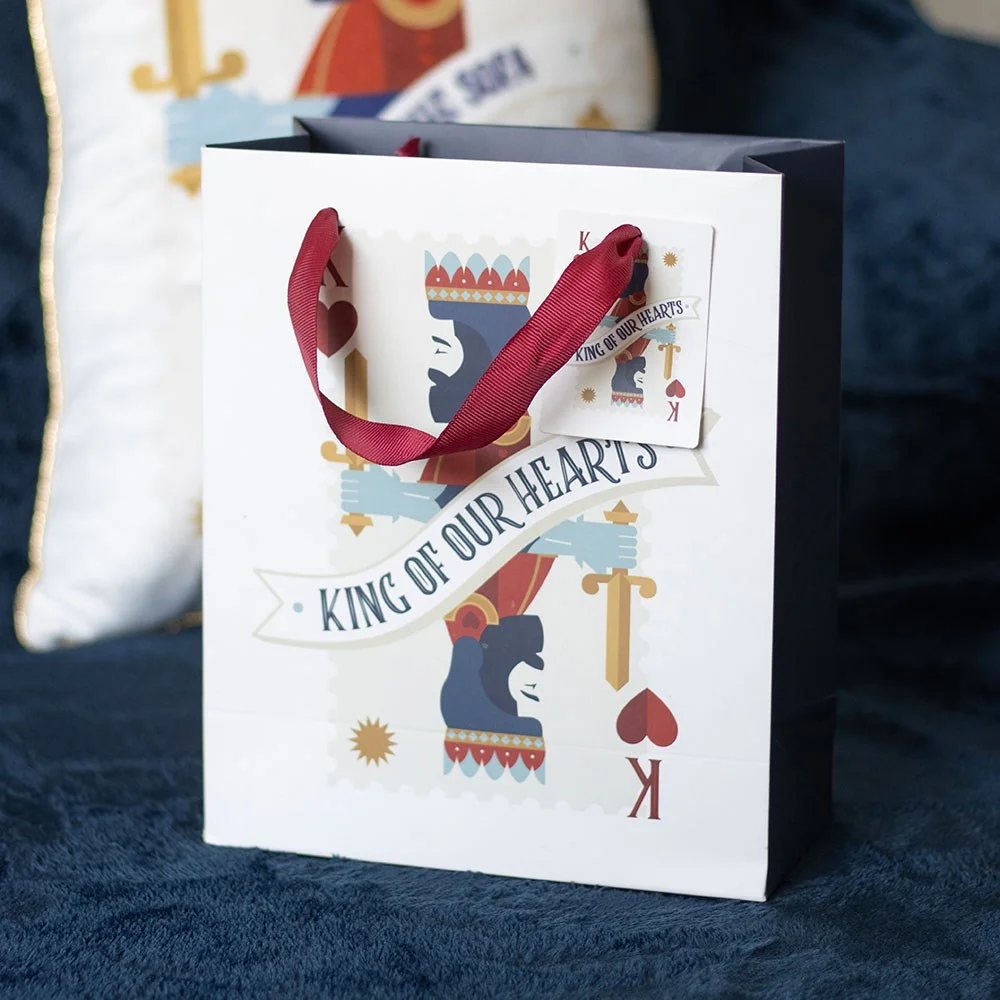 King playing card gift bag with blue, red, and white design featuring "King of our hearts" text, 23cm medium size