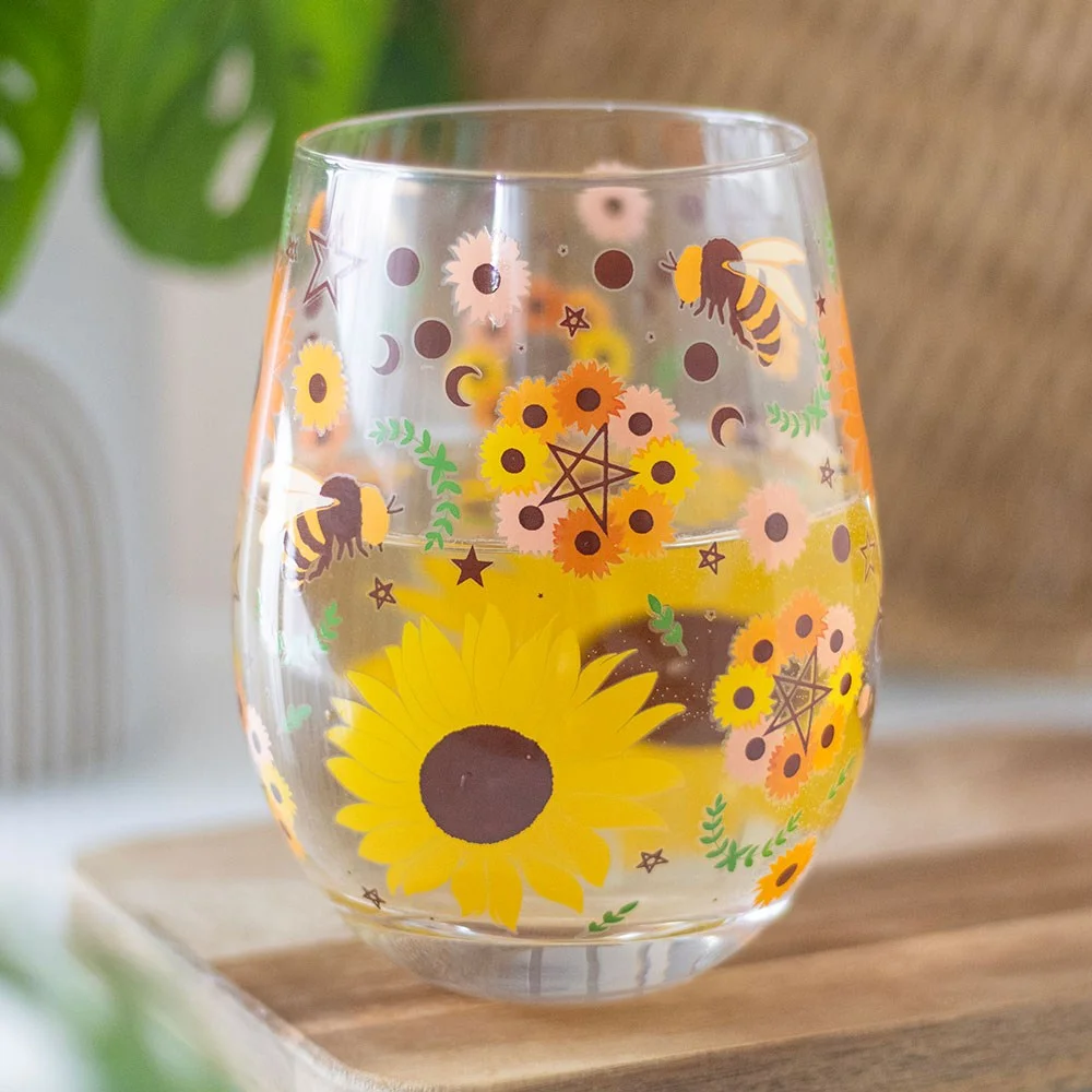 Stemless summer glass with sunflowers, bees, pentagrams and moon phases, 450ml capacity, handwash only.