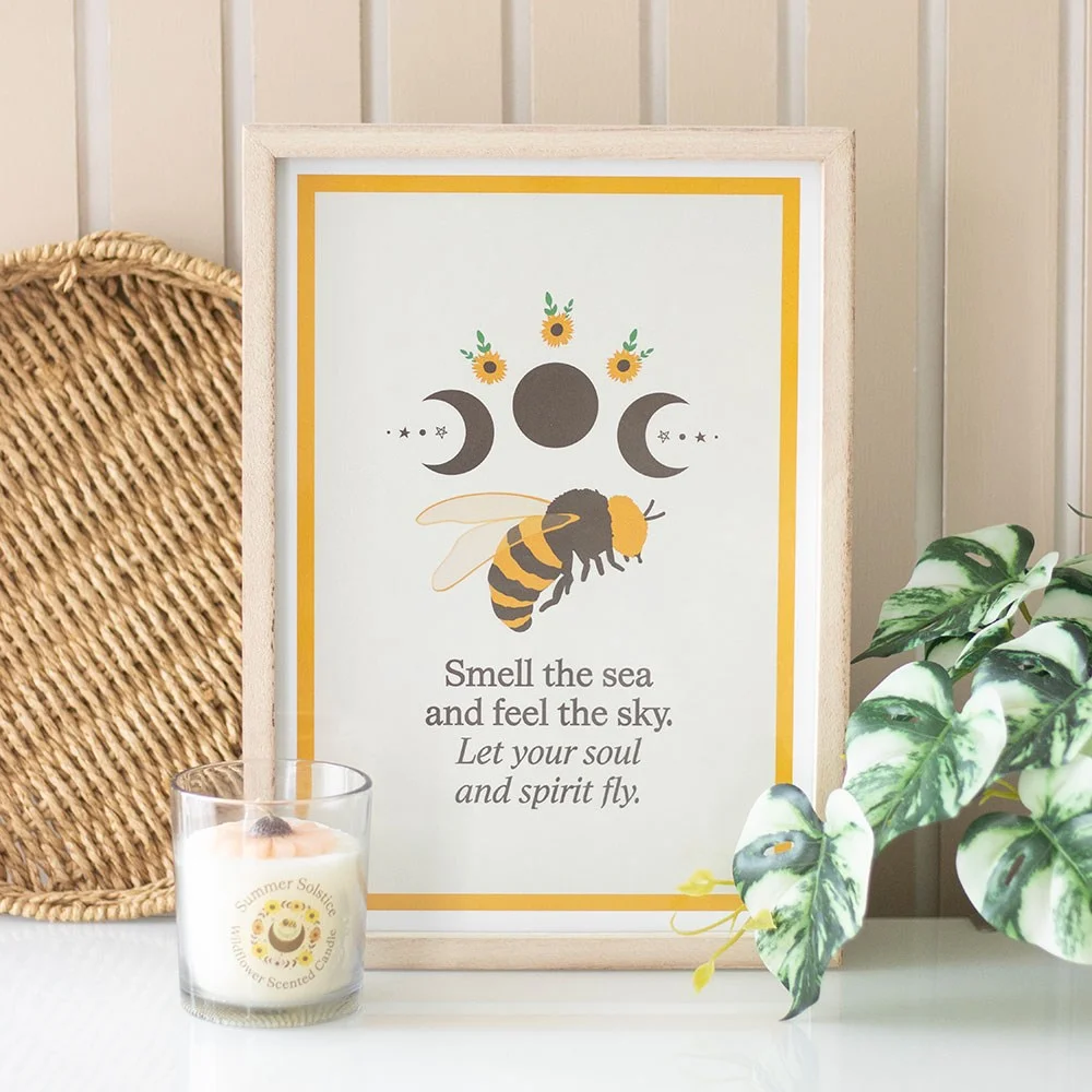 Bee wall art print featuring a bee, sunflowers, moon phases, inspirational text, in a rustic wooden frame