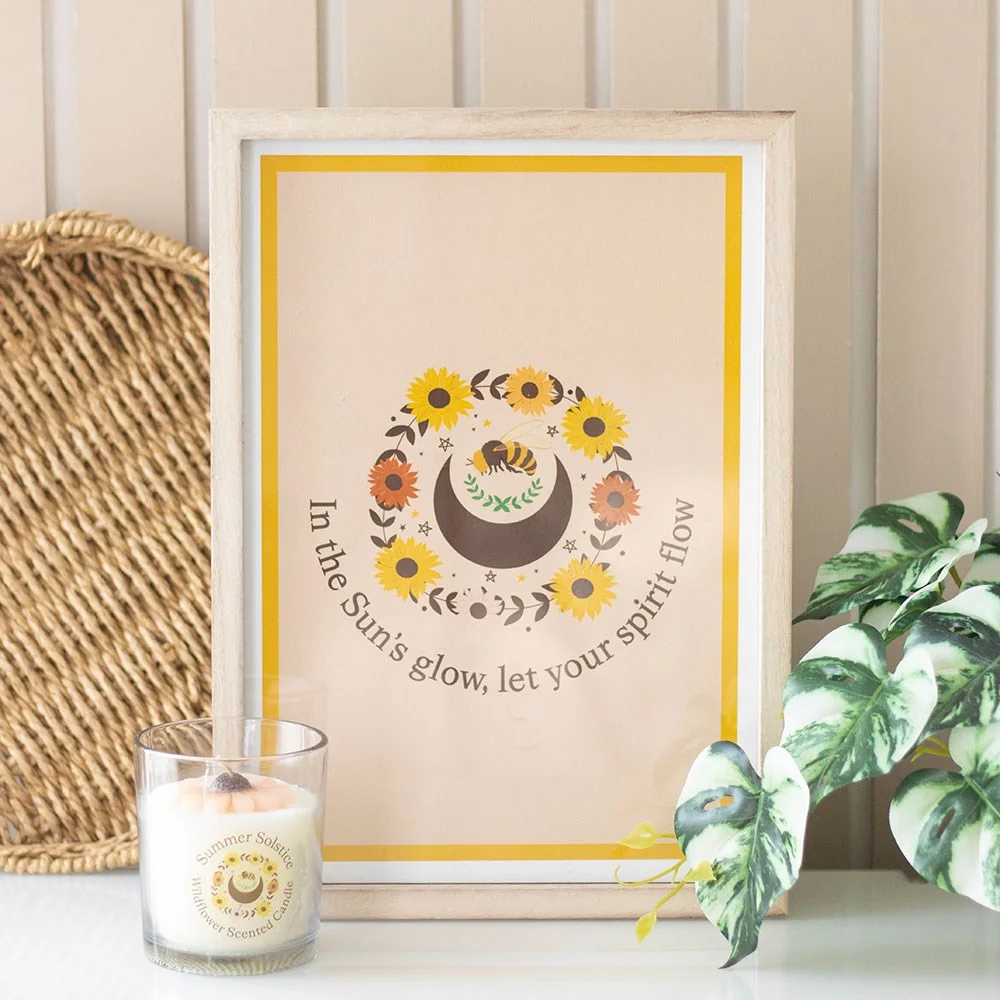 Framed wall art print with bee, sunflowers, crescent moon, and inspirational text in rustic wooden frame