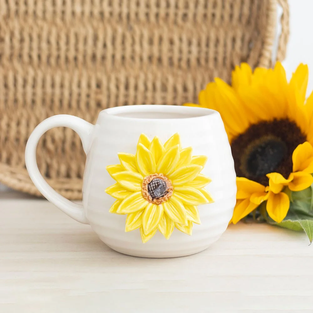 Rounded ceramic 3D sunflower mug with bright yellow flower design, 450ml capacity, handwash only, no microwave use
