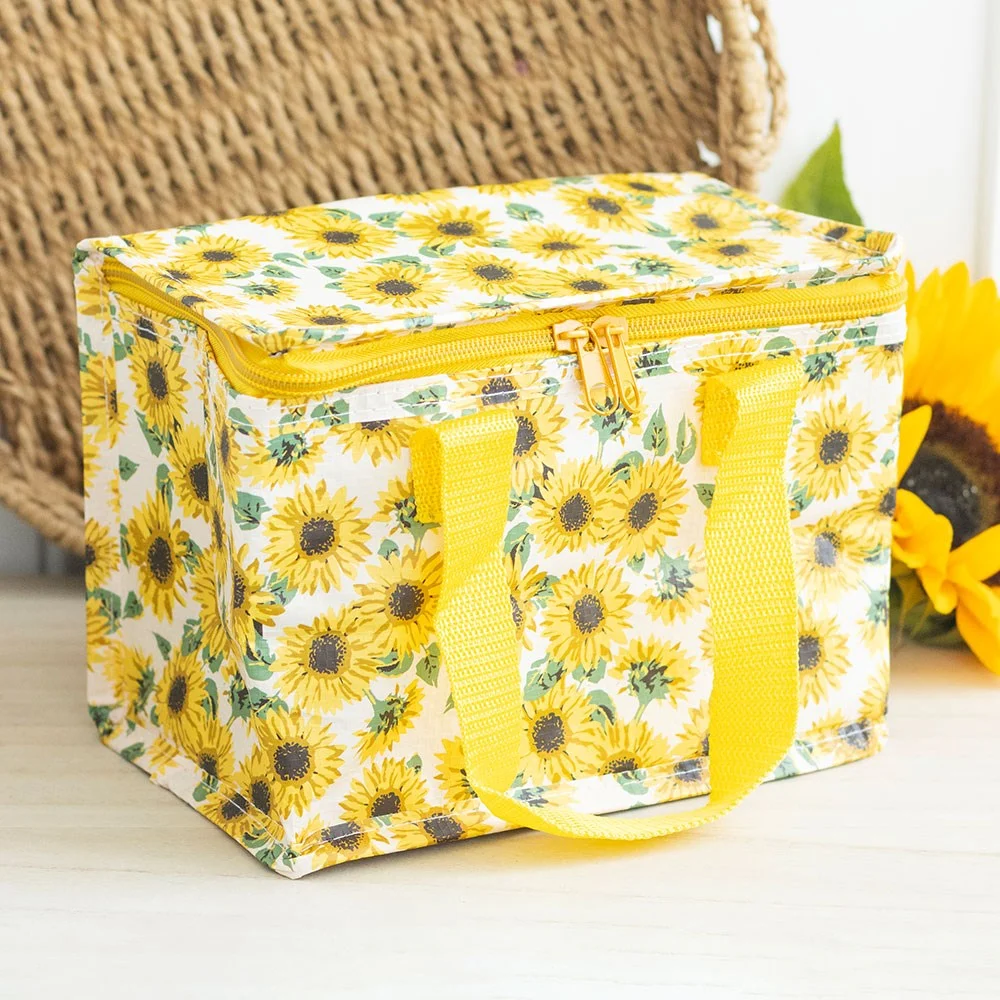 Sunflower lunch bag with bright floral print, insulated interior, made from recycled plastic, ideal for school or work lunches