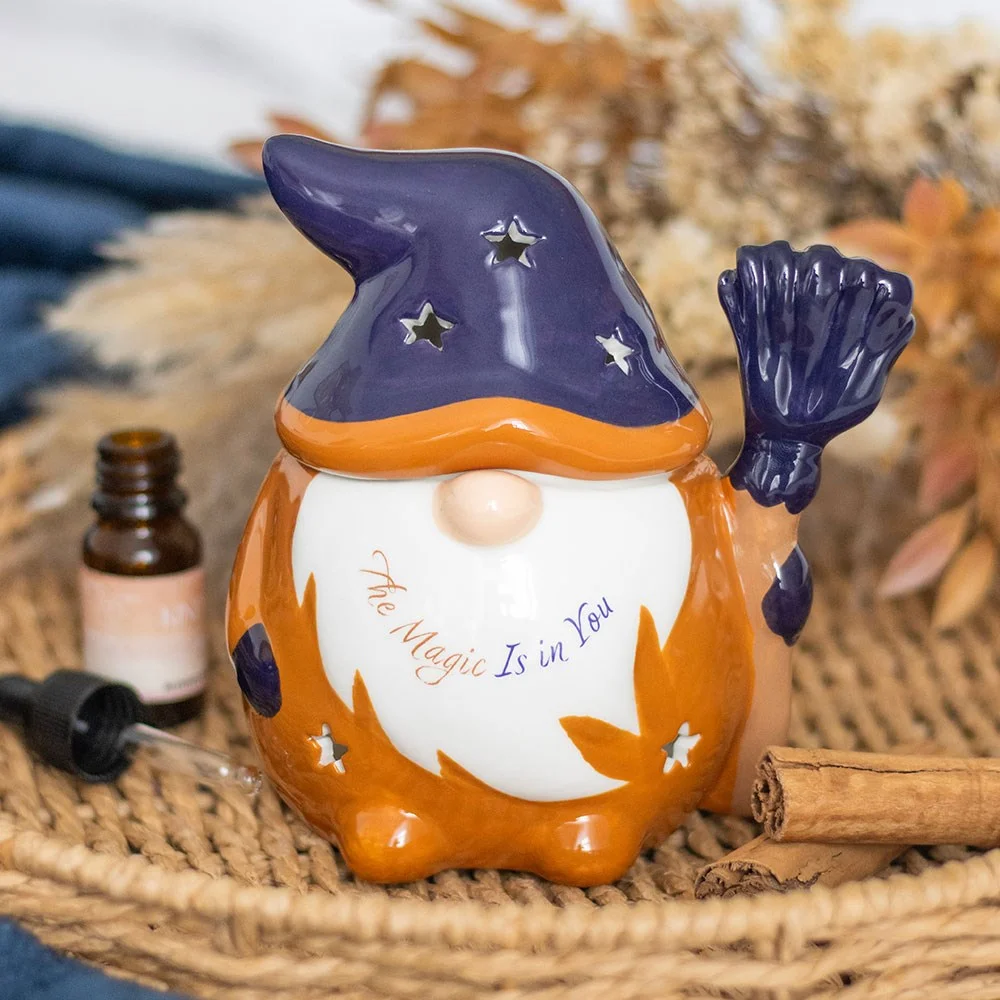Wizard gonk oil burner shaped like a whimsical wizard holding a star, designed for fragrance oil use and cosy ambience.