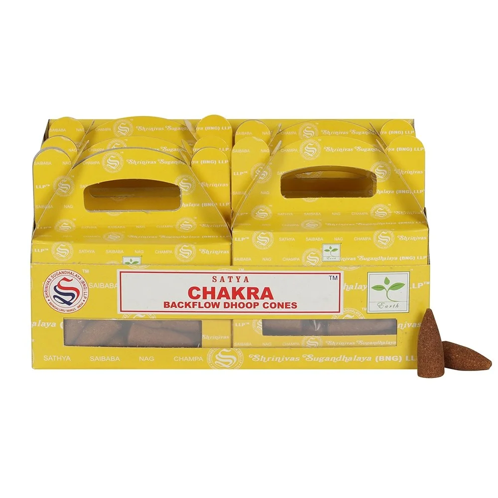 Set of 6 packs of chakra backflow incense cones by Satya in a display box with colorful packaging and cone illustrations
