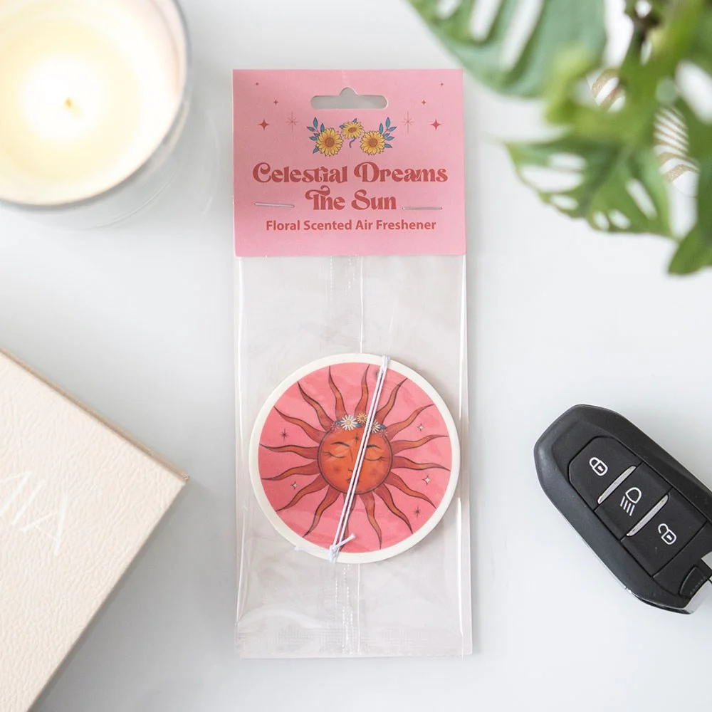Sun-shaped air freshener with vibrant sun design and floral air freshener scent for car use