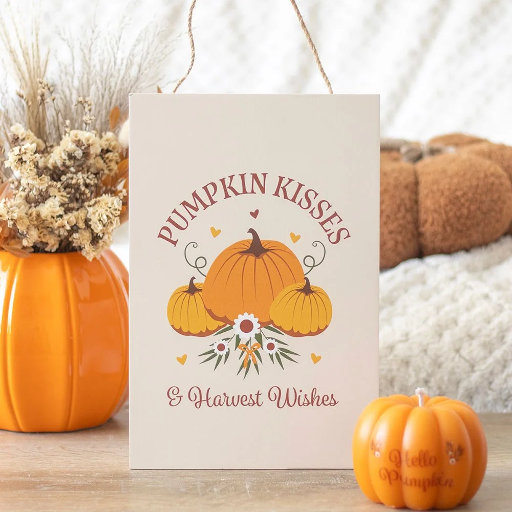 Autumn hanging sign with cosy pumpkin design and "Pumpkin Kisses & Harvest Wishes" text on MDF material