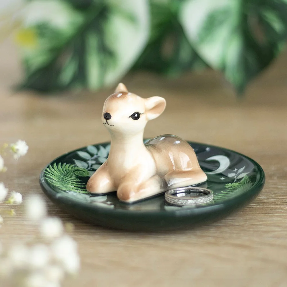 Ceramic trinket dish featuring a serene fawn among forest greenery, perfect for holding rings, keys, or tiny keepsakes.