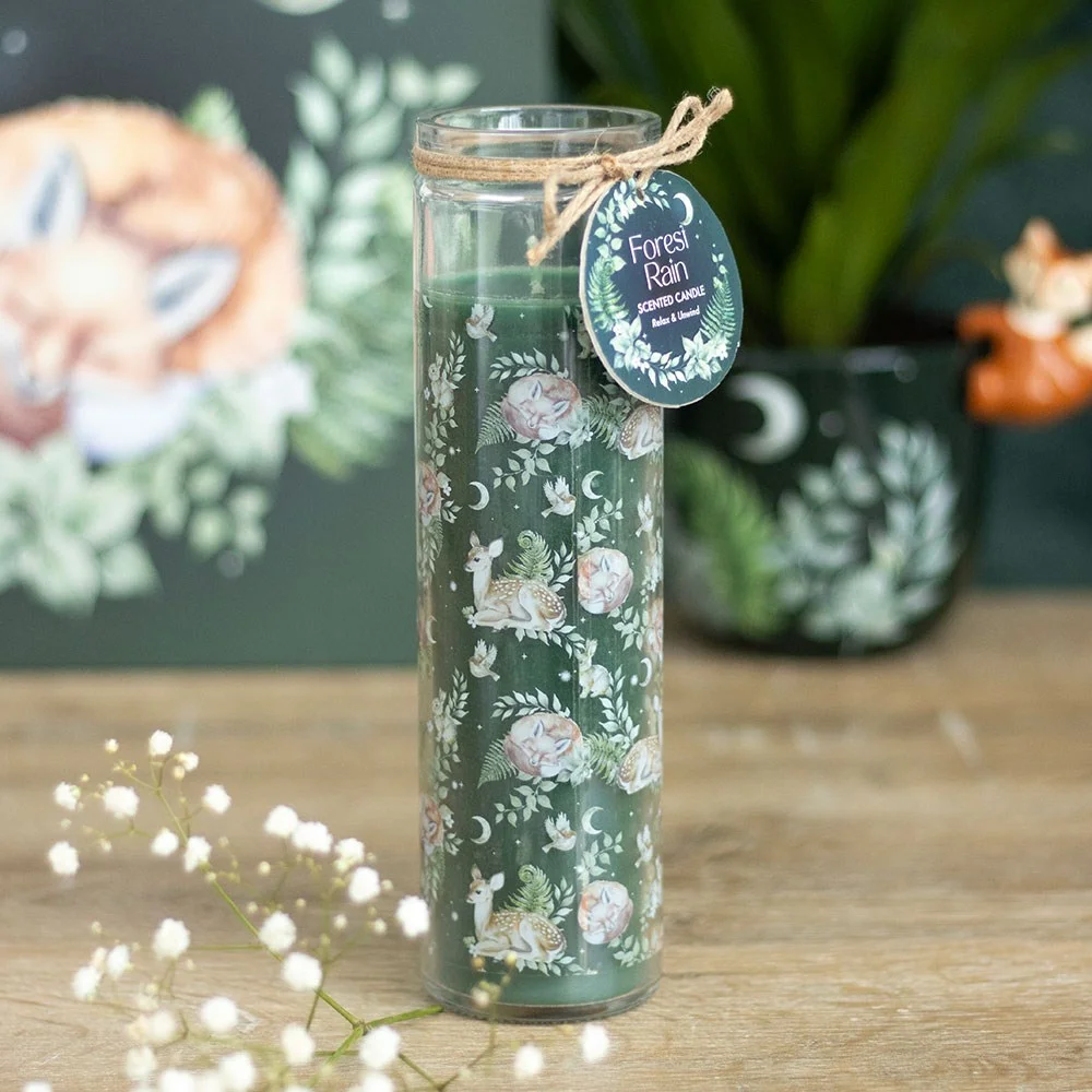 Elegant tube candle with fox and fawn design labeled forest rain candle, made of paraffin wax with 50-hour burn time