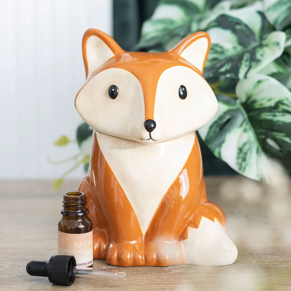 Ceramic fox oil burner shaped like a fox, with a removable lid, designed for wax melts and tealight candles