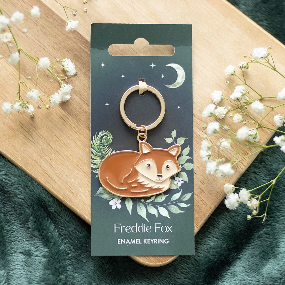 Freddie Fox keyring showing a sturdy enamel charm shaped like an adorable fox on a metal keyring loop