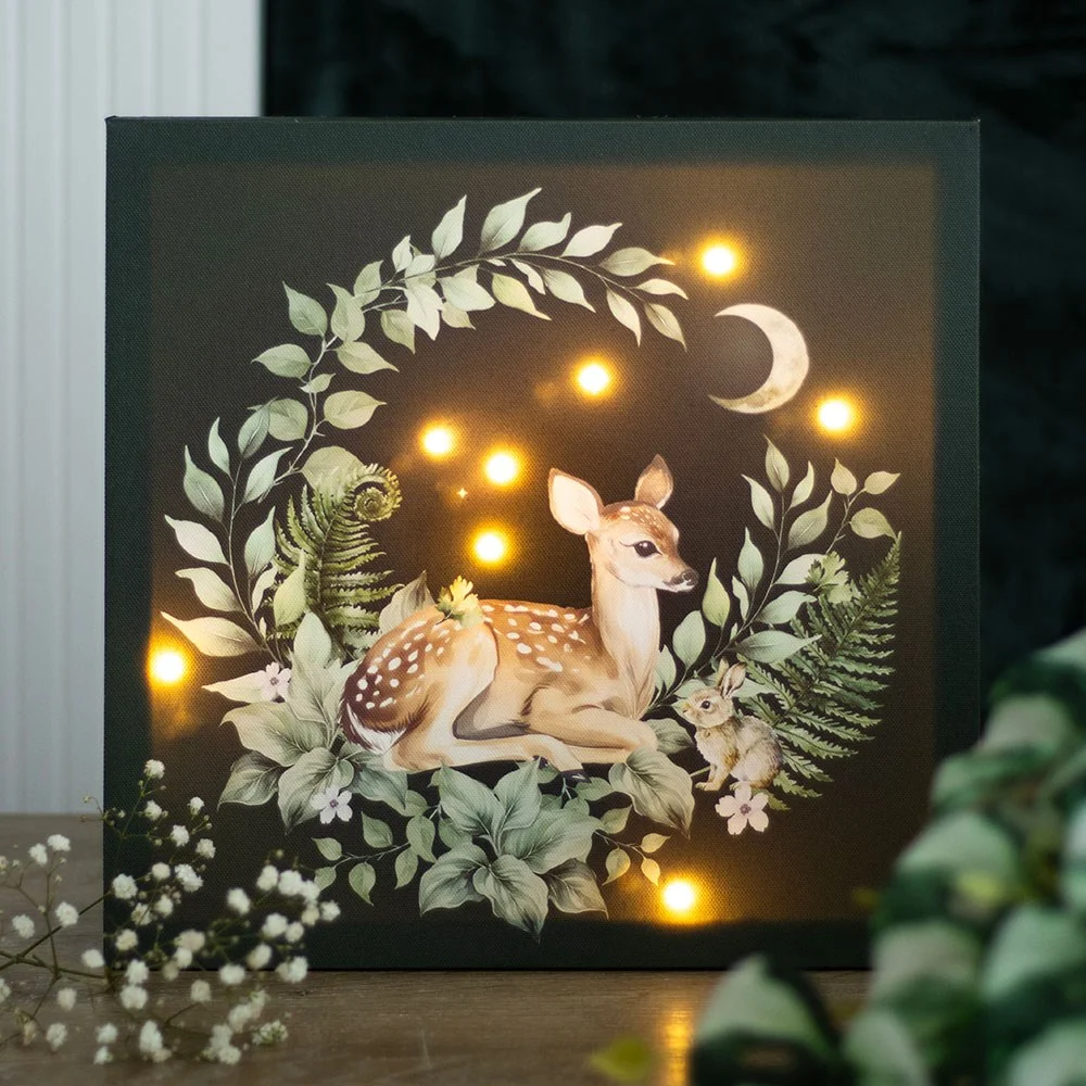 Light up canvas plaque featuring a fawn in a lush forest scene with LED lights, ideal for children's rooms and nurseries