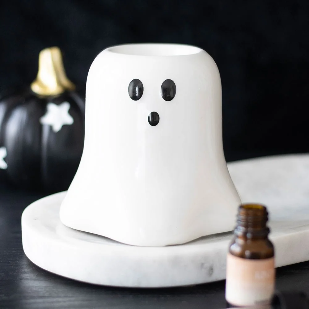 White ceramic ghost oil burner with bowl on top and tealight holder below, designed for wax melts or fragrance oil