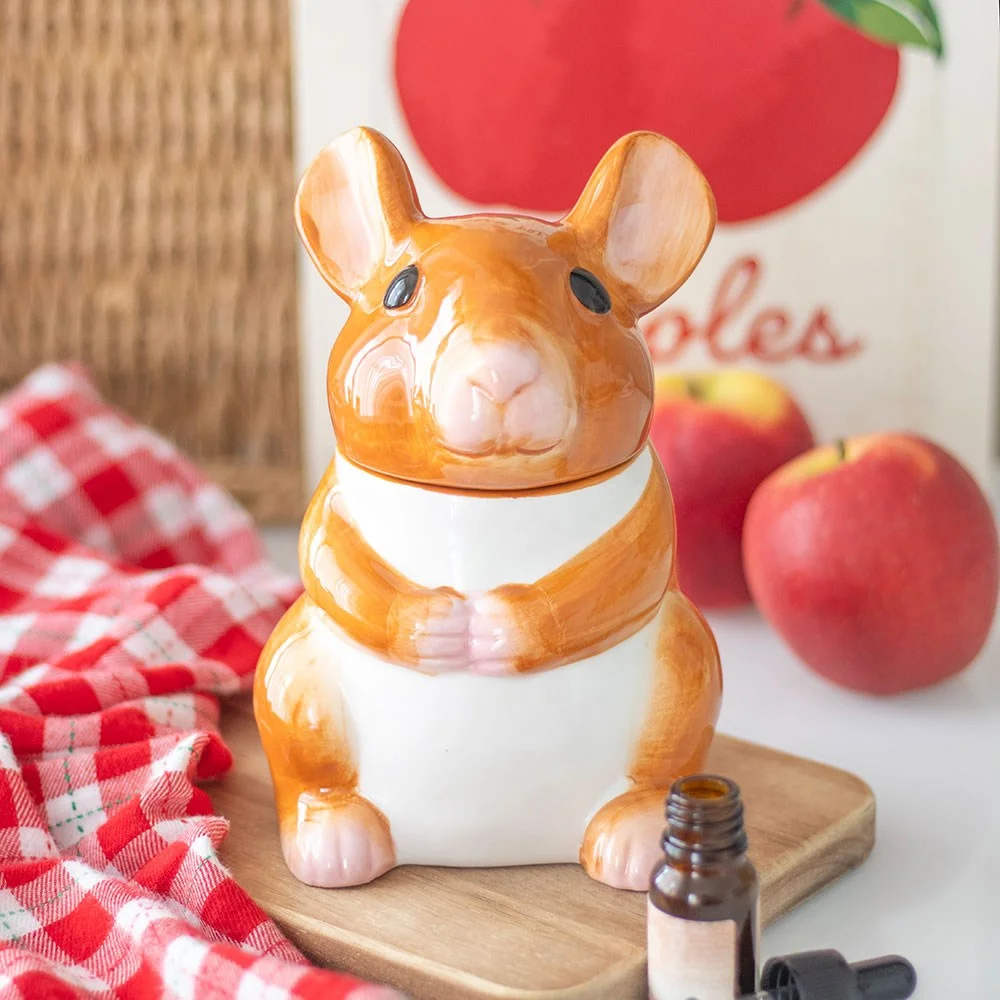Ceramic mouse shaped oil burner in soft grey with a small bowl on top for wax melts or essential oils