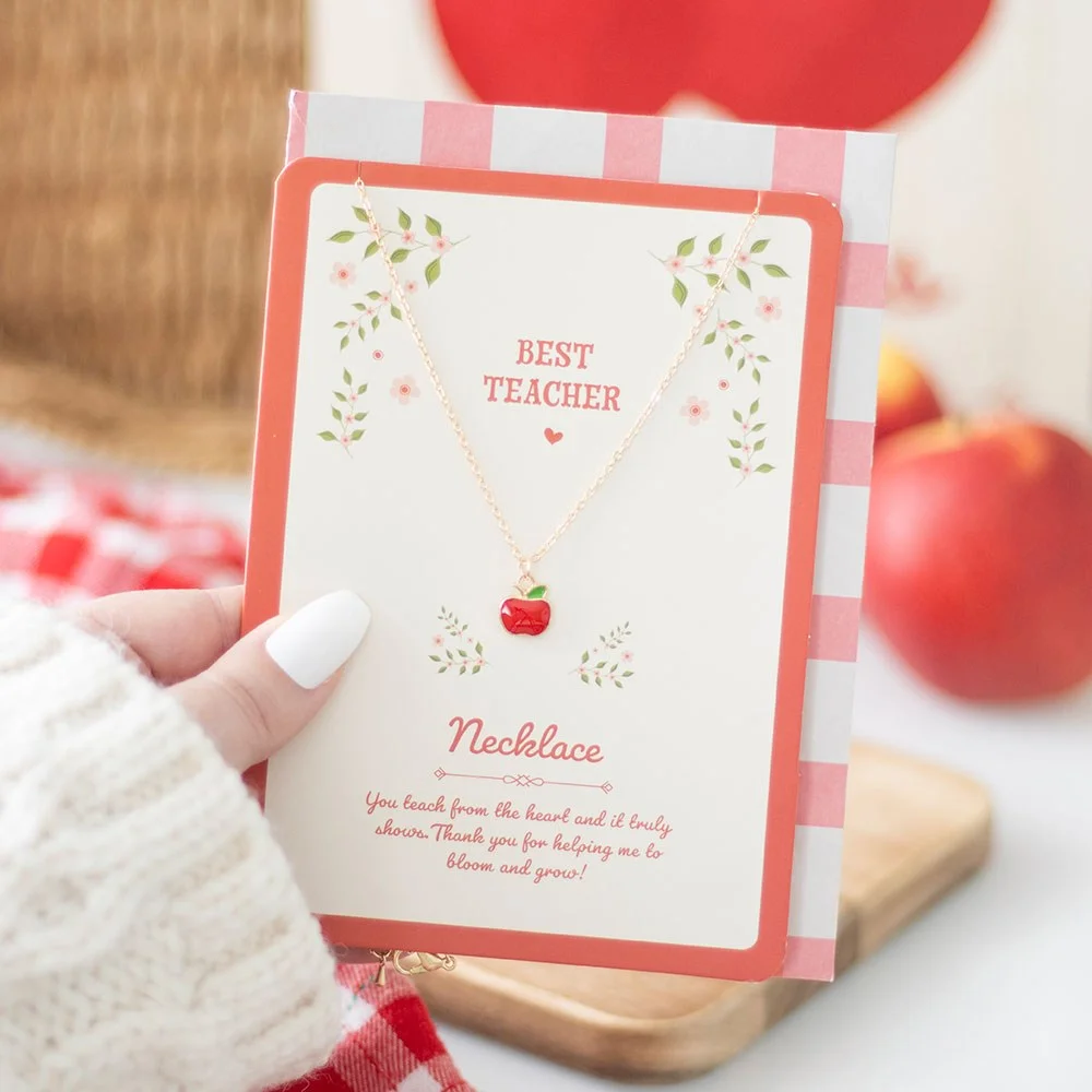 Teacher apple necklace pendant shaped like a red apple on a greeting card, nickel-free stainless steel accessory gift