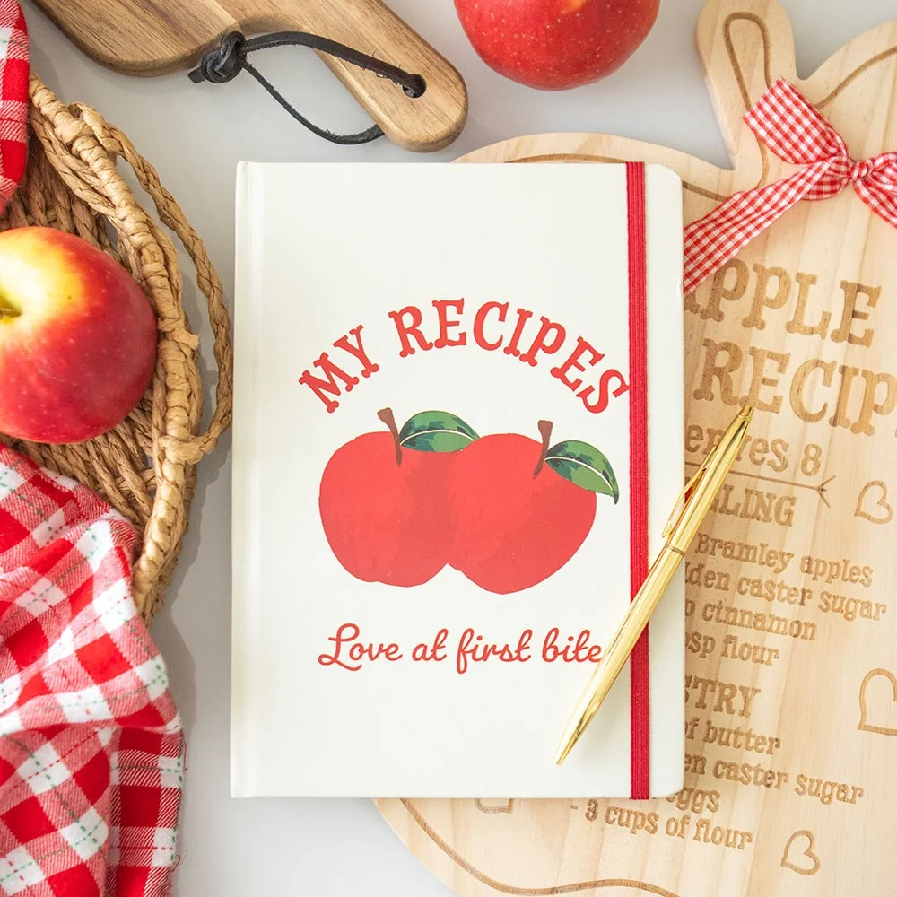 A5 recipe notebook titled My Recipes with lined pages and a pen resting on top, ideal for organizing kitchen recipes