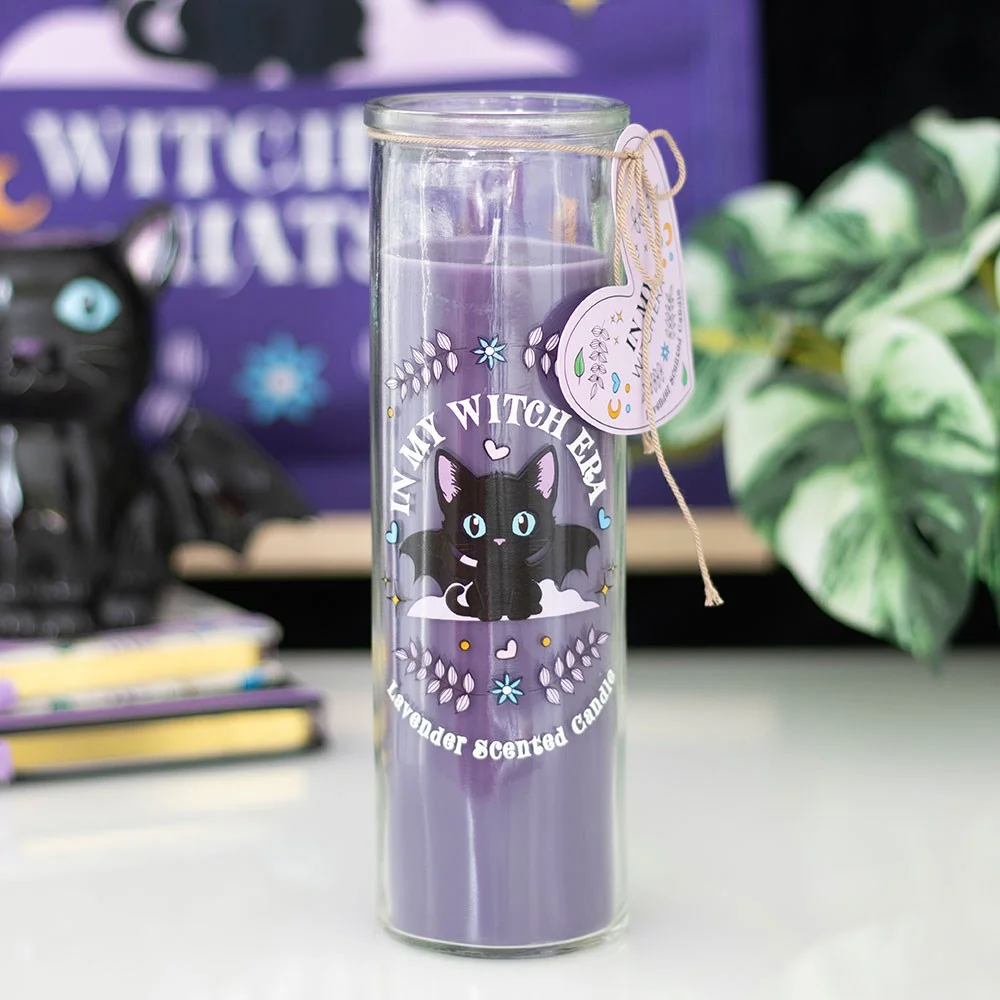 Lavender scented candle in a clear tube featuring a black cat with bat wings illustration on the label