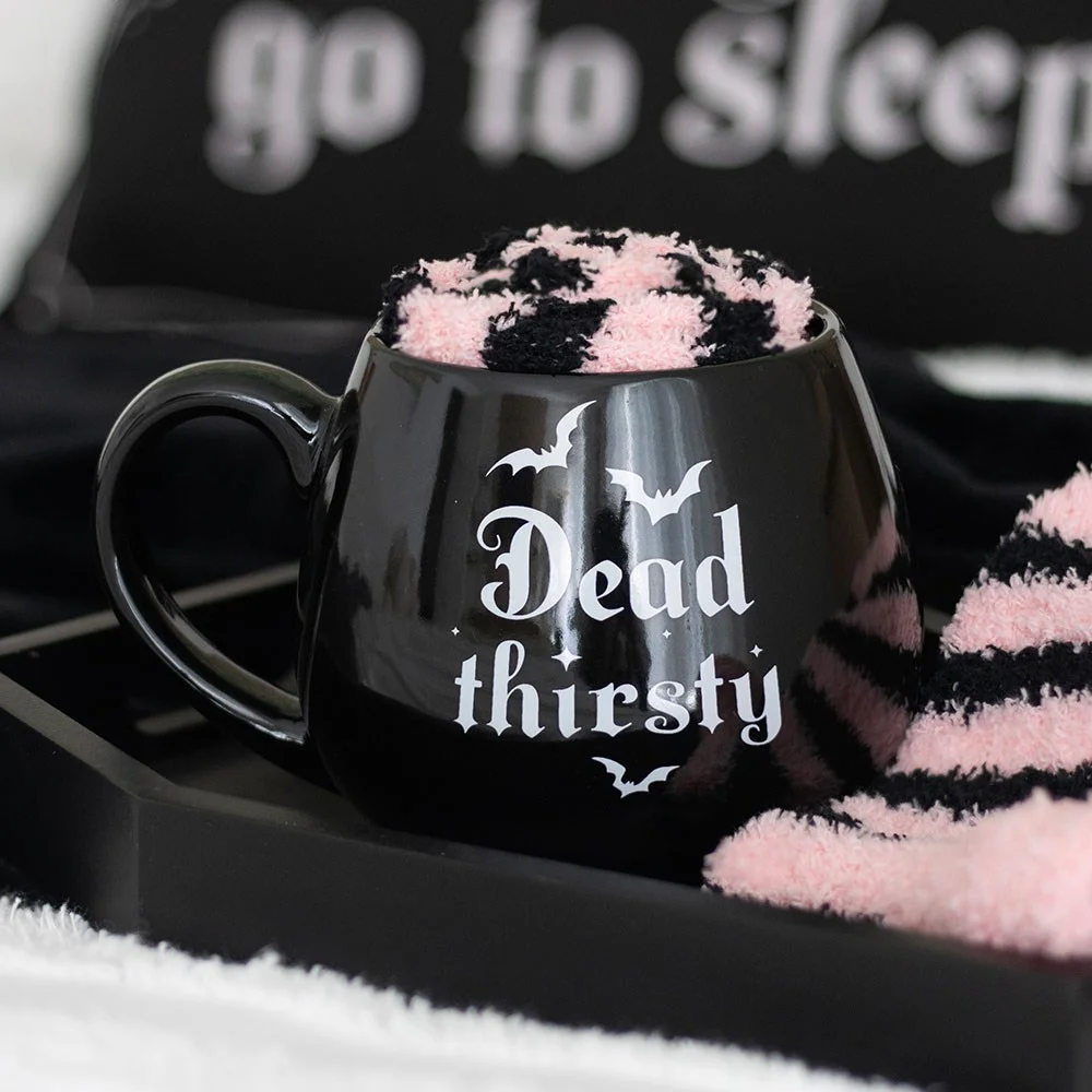 Dead Thirsty mug set with ceramic mug and matching pink and black gothic socks, 500ml capacity, microwave safe