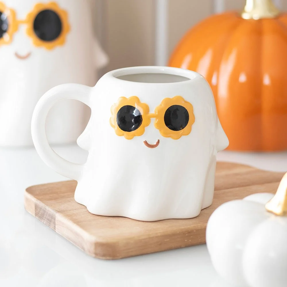 Ceramic ghost mug with groovy 60s sunglasses, 500ml capacity, perfect for coffee or Halloween gifts