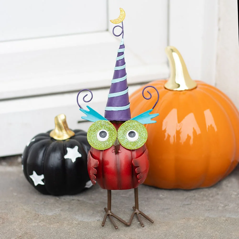Red owl ornament wearing a black witch hat with curly wire details, perfect for Halloween decor