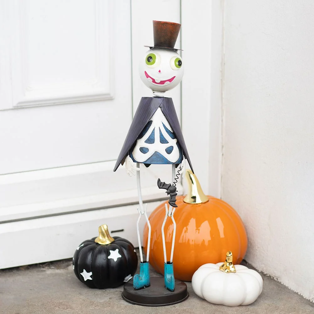 Metal skeleton ornament wearing a top hat and cape, designed for Halloween decoration, suitable for outdoor use