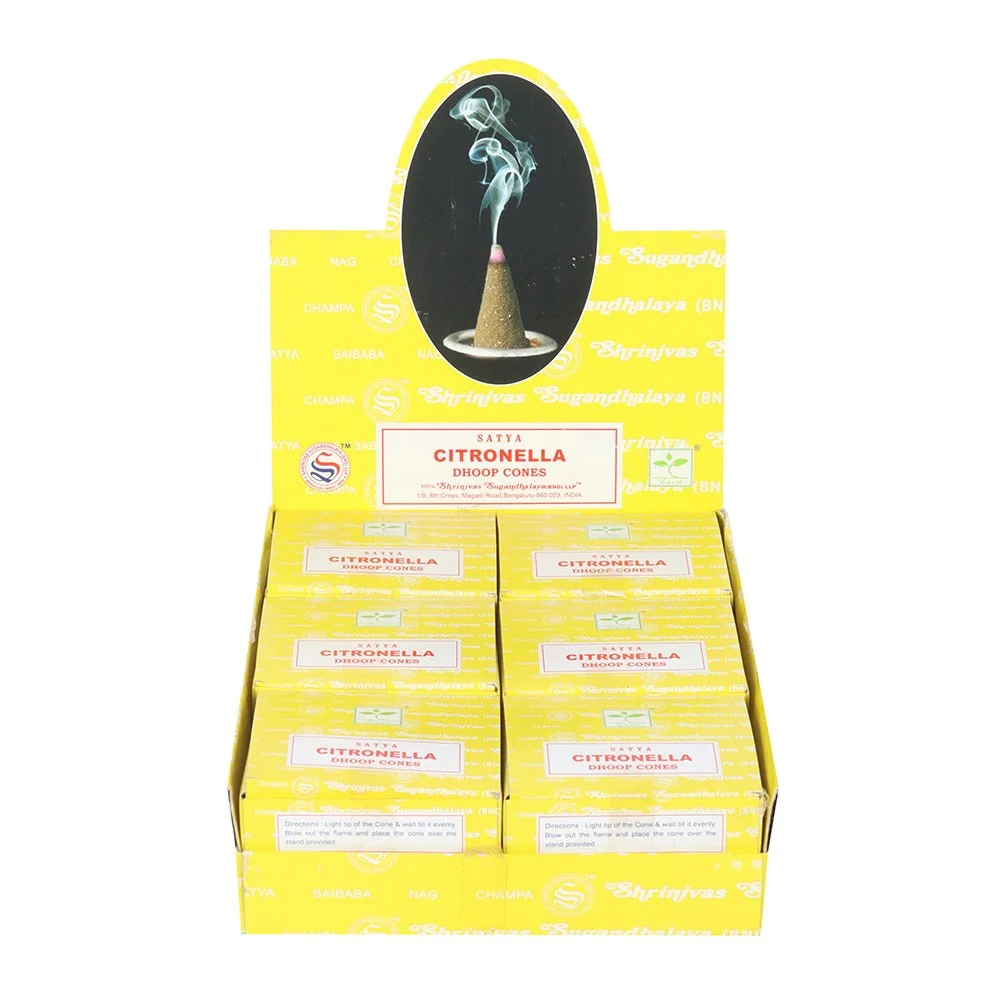 Set of 12 packs of Satya citronella incense cones in yellow and green packaging arranged in a display box