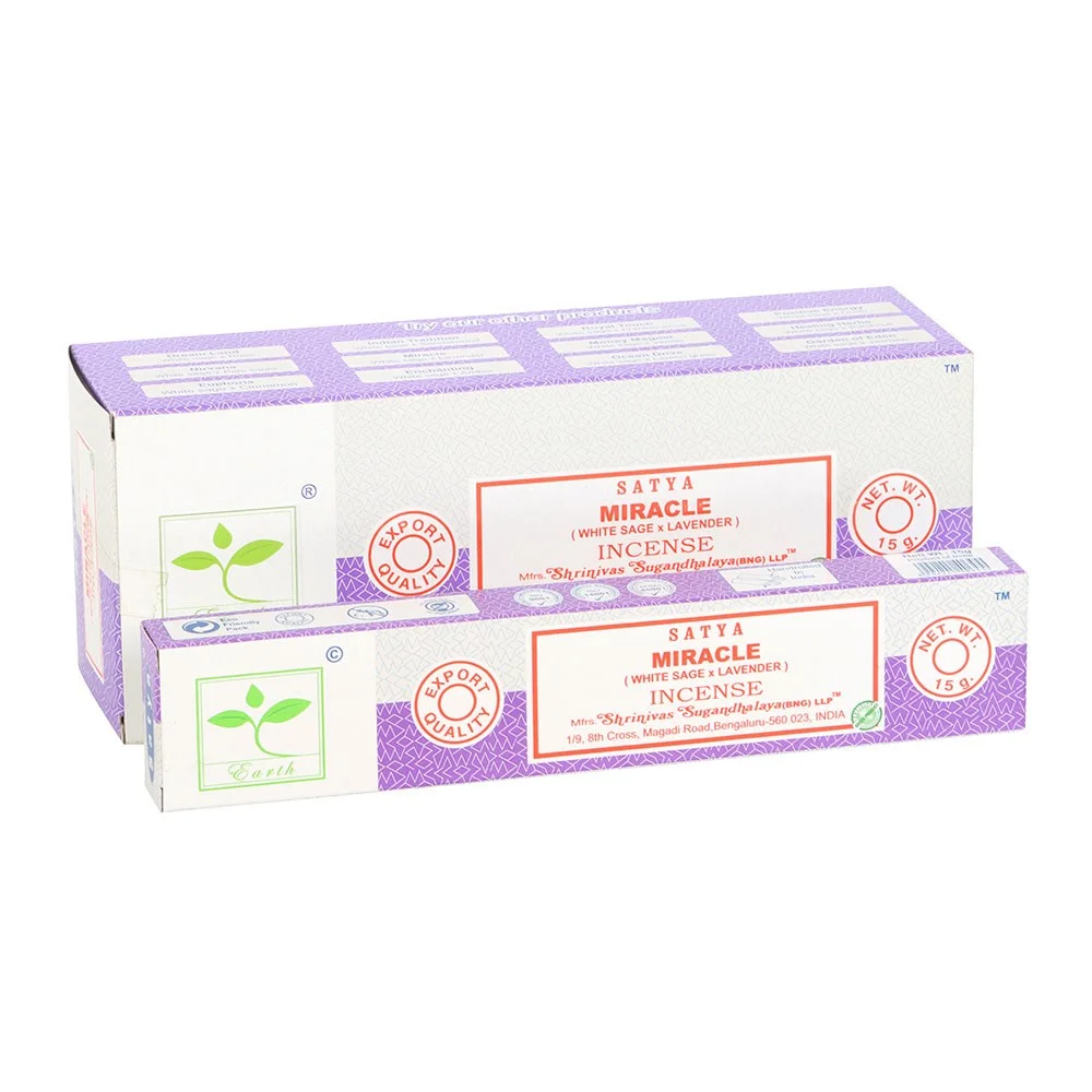 Set of 6 packs of Satya incense sticks in Earth Satya Miracle fragrance packaging arranged in a display box
