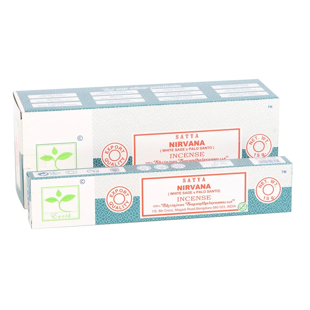 Set of 6 Satya Nirvana Earth incense sticks packs arranged in a display box with calming blue and green packaging