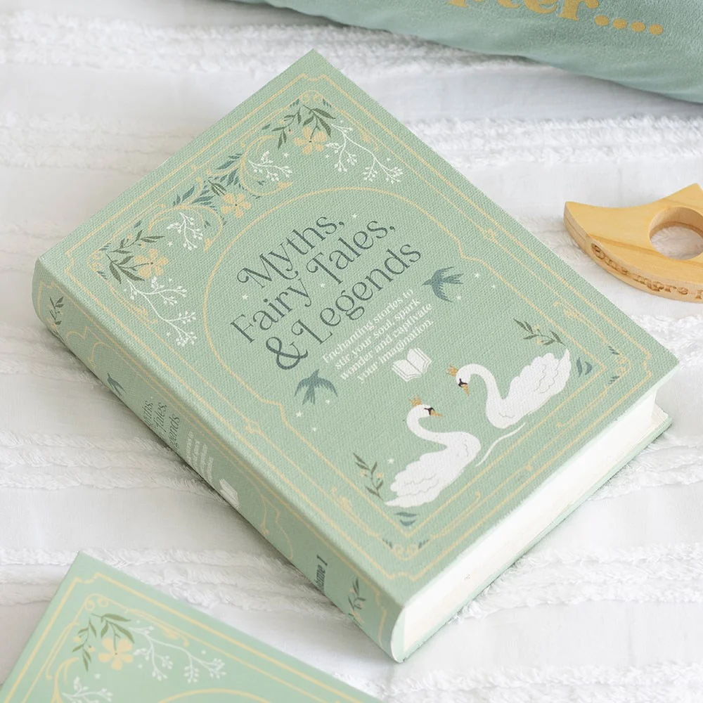 Green MDF book shape storage box with debossed text and detailing on cover and spine.