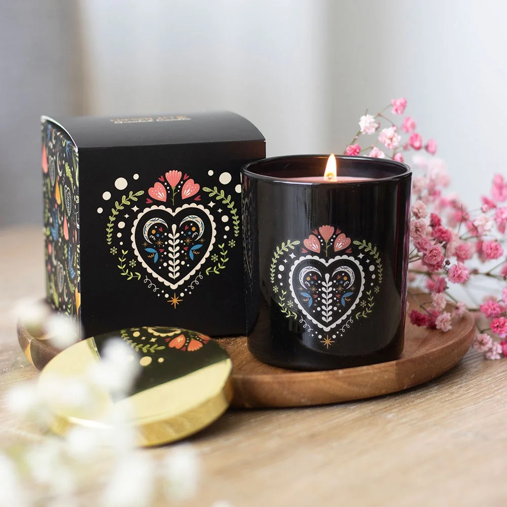Black glass jar French tulip scented candle with folk heart design, elegant and ideal for cosy floral fragrance at home