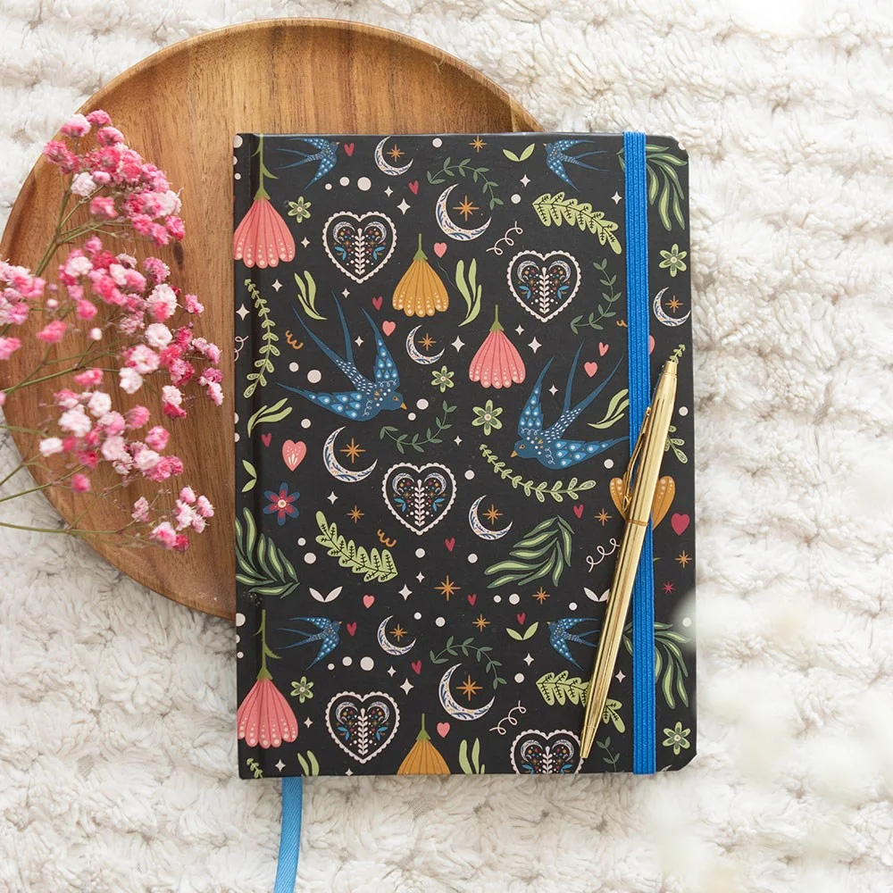 A5 notebook with bold Midnight Bloom floral print cover, 100 sheets, 200 lined pages for writing and organizing tasks