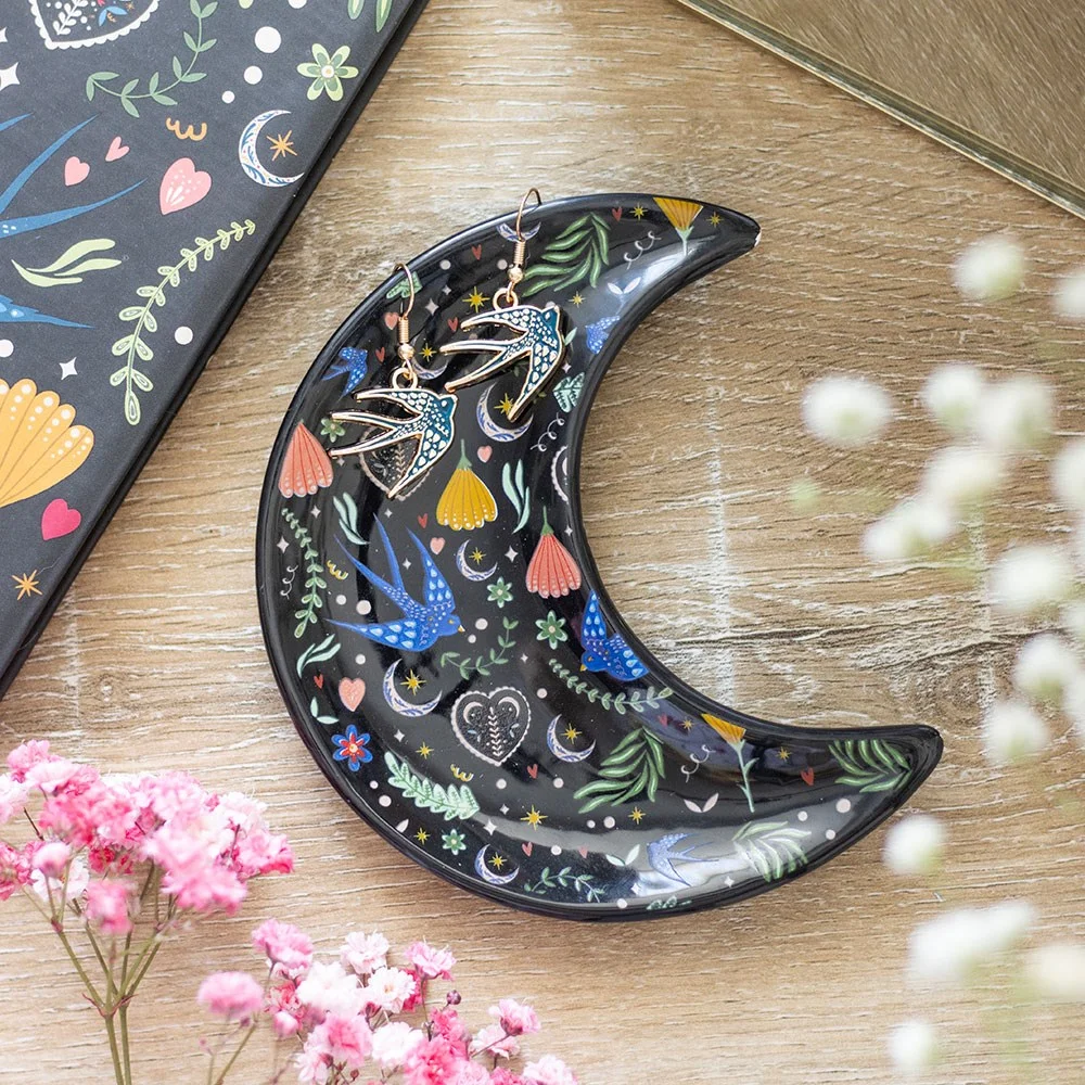 Midnight Bloom crescent moon trinket dish with floral design on curved crescent shape in dark tones