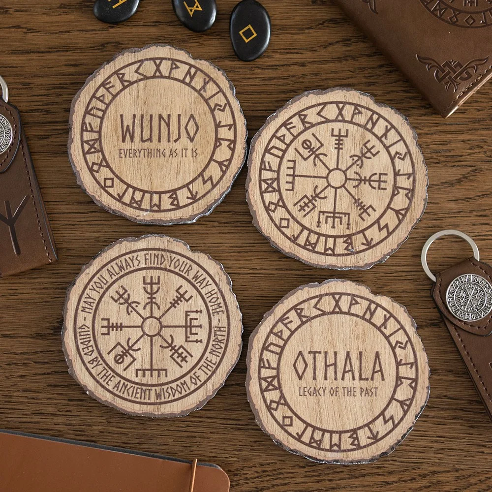 Set of 4 wood slice Norse mythology coasters each engraved with a unique Viking rune or symbol on natural wood background