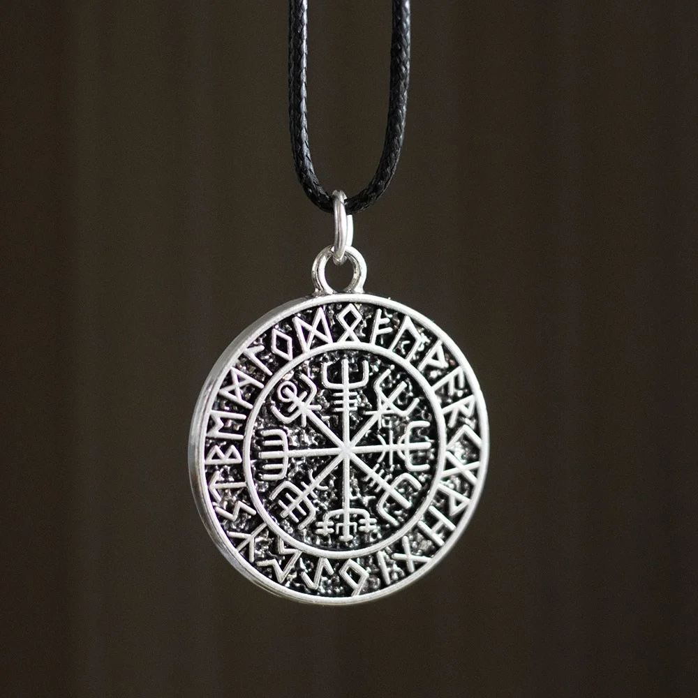 Vegvisir Viking necklace with ancient guidance symbol worn on a rustic black cord