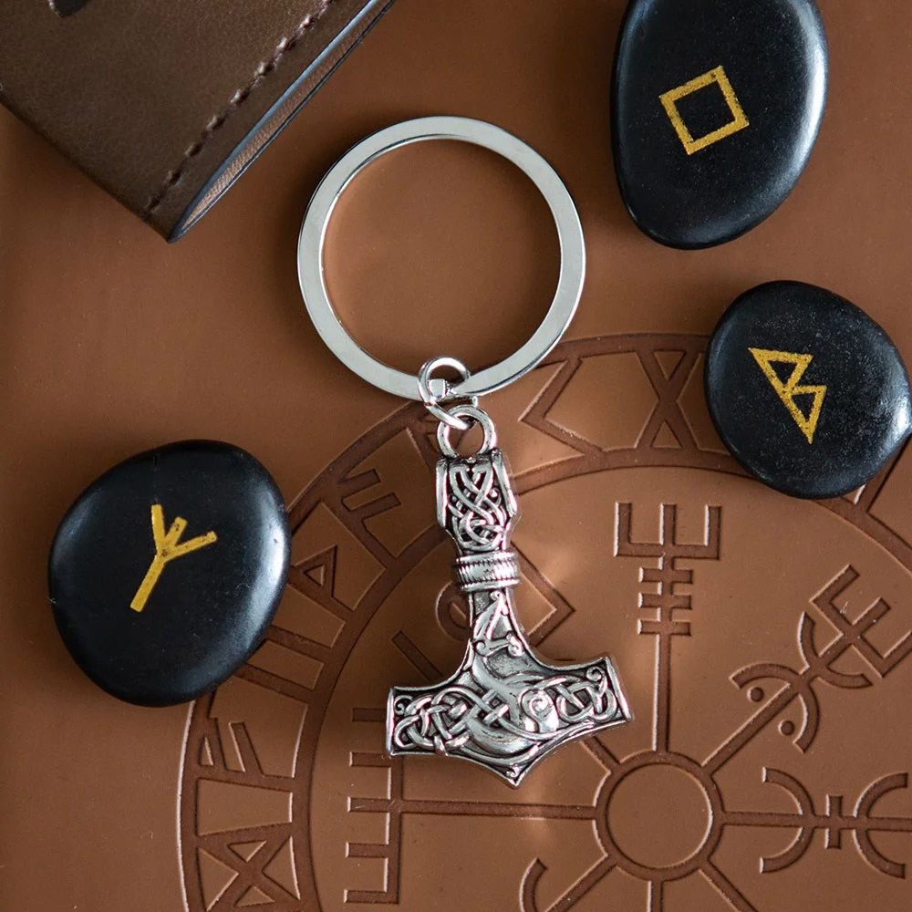 Thor hammer keyring made of durable alloy shaped like Mjolnir, the legendary Viking hammer on a keyring loop